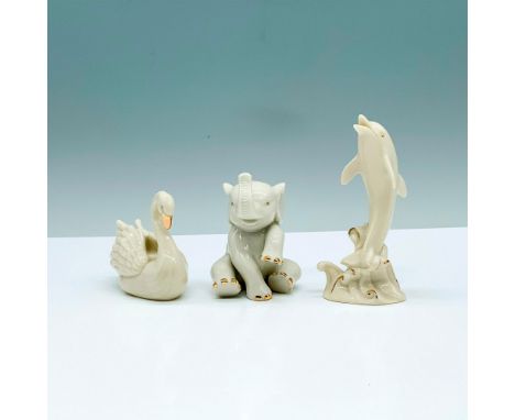 A set of three off white animal figures with gold-colored accents consisting of a dolphin, a swan, and elephant. Lenox backst