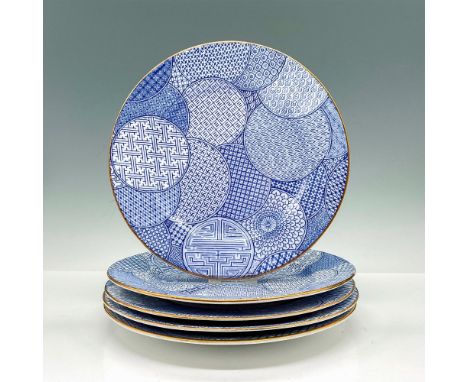 Set of five salad plates with overlapping round Asian inspired geometric designs over a white ground with gold gild rims. Dis