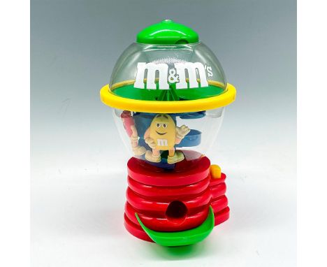 Cute plastic dispenser with M&amp;M characters inside clear center with green top and red bottom. Mars Inc. backstamp. This i