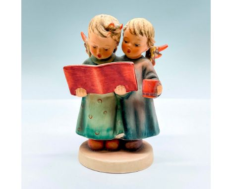Hand painted group figure of two angels reading a book. Goebel backstamp. This item has its original box: 6.75"L x 5.5"W x 3.
