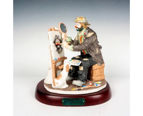 Limited edition, hand painted bisque porcelain depicting figural clown Weary Willie painting a self portrait with his puppy g