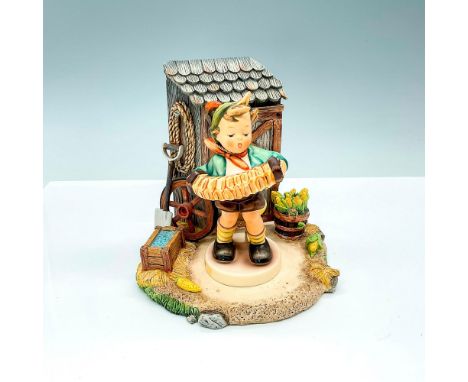 This Goebel Hummelscape is titled Barnyard Display and has its certificate of authenticity. Included is this figurine number 