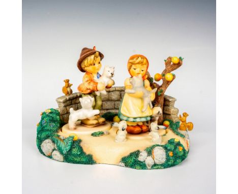 Limited edition hand painted in matte finish figurines entitled Frisky Friends and Tender Love, designed to be displayed atop