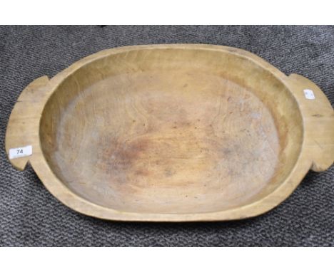 A large 19th century primitive wooden salting trough having handles.
37cm wide by 56cm long
