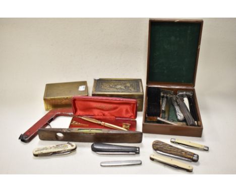 A miscellany of vintage and antique items, to include brass boxes, one having embossed eagle design, cut throat razors, novel