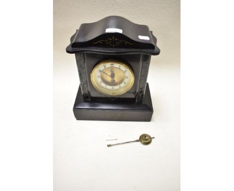 A Victorian marble mantel clock having green veined columns to sides, etched detailing to front and bevelled glass door with 