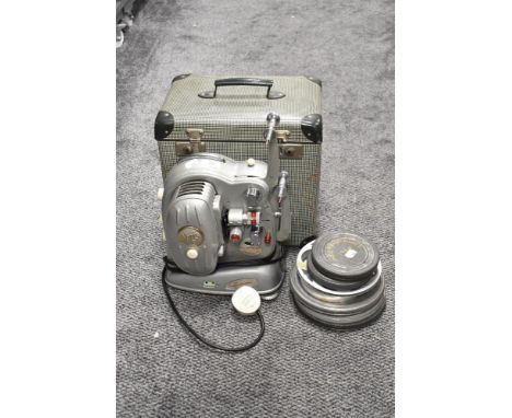 A vintage 1950s Noris-8 Synchromer super projector with case and film reels.