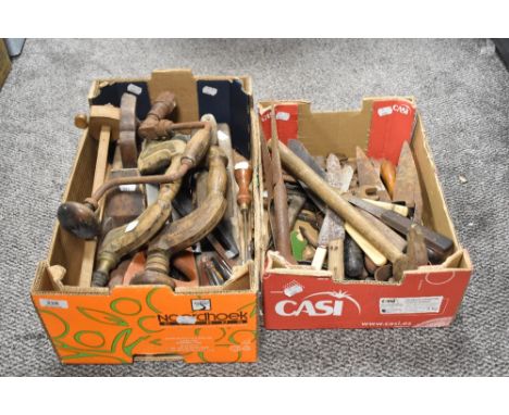 A box of vintage hand tools, including bit and braces, planes and more.