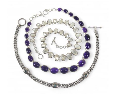 A sterling silver large link chain necklace, with T bar fastening, marked 925, with three oval lozenges each with a small cab