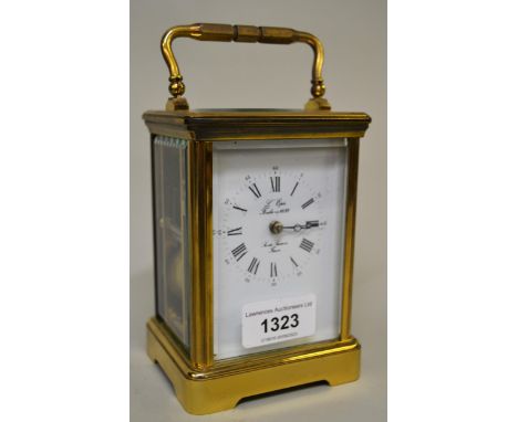 20th Century brass cased carriage clock by L' Epee, with white dial having Roman numerals, in original box, 14.5cm high 