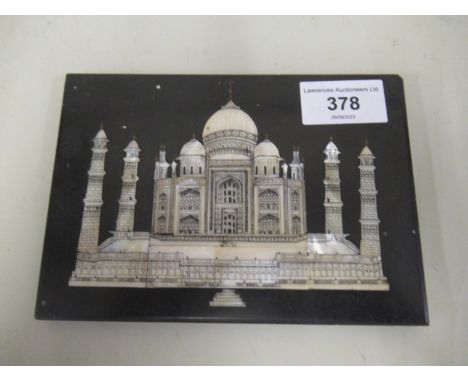 Mother of pearl black slate rectangular lid decorated with the Taj Mahal, 11 x 16cm 