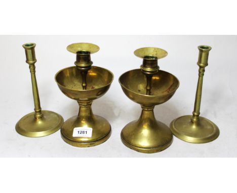 Pair of brass candlesticks with bowl form drip trays, together with a pair of brass slender column candlesticksBrass candlest