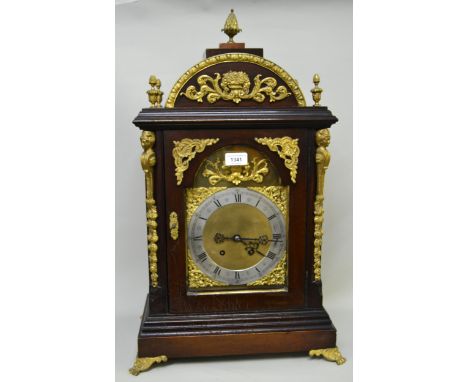 Large early 20th Century mahogany gilt metal mounted bracket clock in Georgian style, the silvered dial with Roman and Arabic