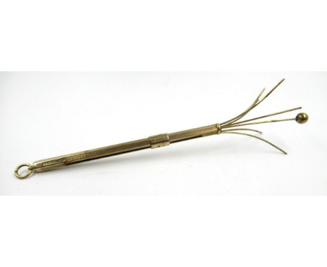 9ct Gold cocktail swizzle stick, 6.2gSlightly bent arms but generally in good condition 