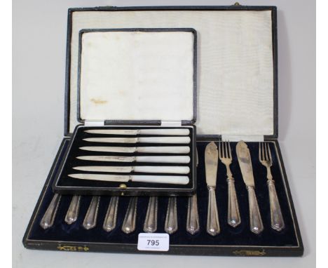 Set of six Sheffield silver mother of pearl handled cake knives in fitted box (one at fault), together with a cased set of si