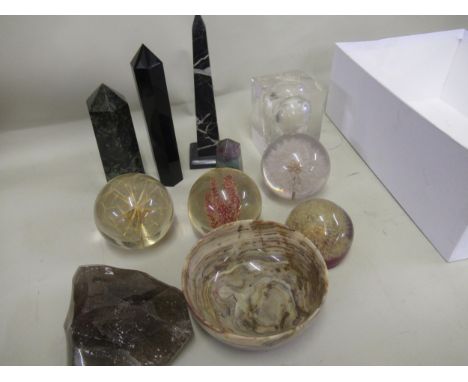 Box containing a group of three polished crystal obelisks, turned stone dish and various acrylic and other paperweights etc. 