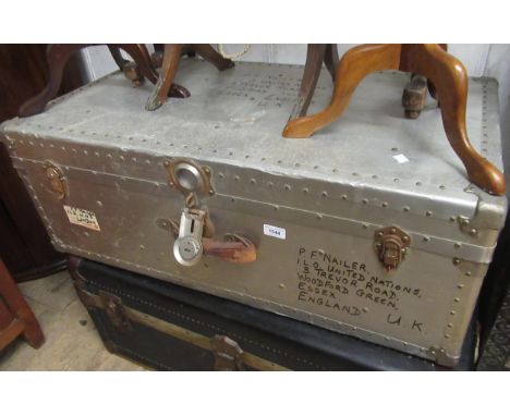Aluminium covered travel trunk bearing various flight labels 