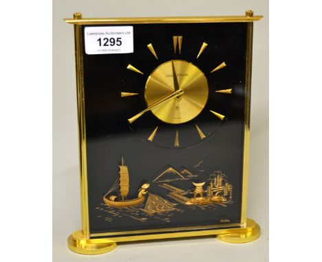 Jaeger LeCoultre 488 Marina eight day mantel clock with circular gilt dial, decorated in high relief with a view of a Japanes