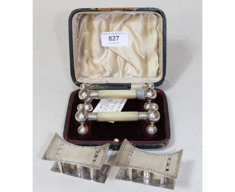 Pair of Sheffield silver and mother of pearl knife rests (one lacking collar), in original fitted case, dated 1897 (2.8oz t),