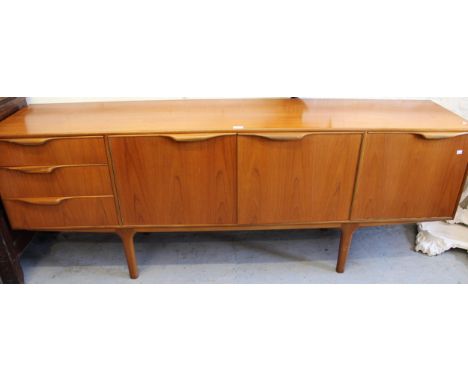 Mid 20th Century teak dining room suite by McIntosh of Kirkaldy comprising:  sideboard 201.5cm wide, pull-out extending dinin