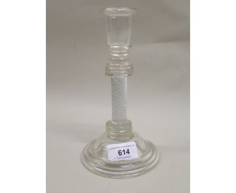 19th Century glass candlestick in 18th Century style, the knopped air twist stem above circular dome base, 7.5ins high 
