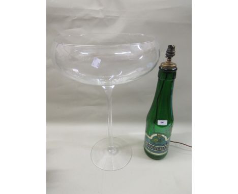 Green glass Babycham bottle table lamp fitted with  an earlier shade , together with a large glass, 55cm high 