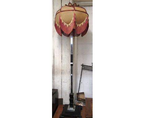 Art Deco chrome and black painted standard lamp with stepped base, having original shade (at fault) 