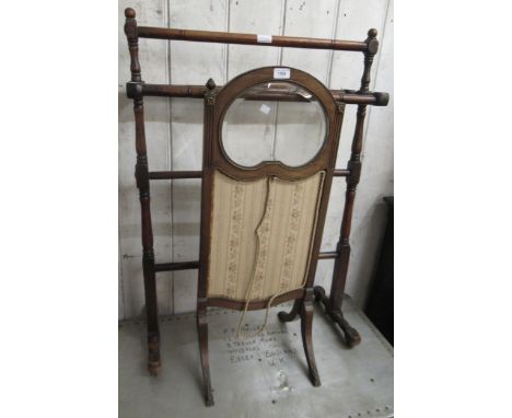 20th Century French mahogany gilt metal mounted and glazed firescreen (at fault) and a late 19th Century mahogany towel rail 