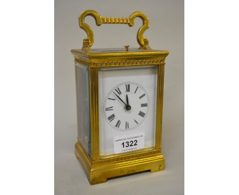 20th Century gilt brass cased repeating carriage clock, the two train movement striking on a gong, having an enamel dial with