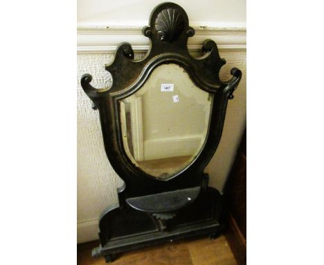 Victorian cast iron wall / washstand mirror, the shaped top with a shell surmount above a bevelled plate and moulded base wit