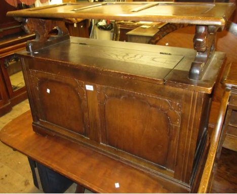 Mid 20th Century oak monk's bench with two panelled front on bracket feet, 72 x 96 x 40cm 