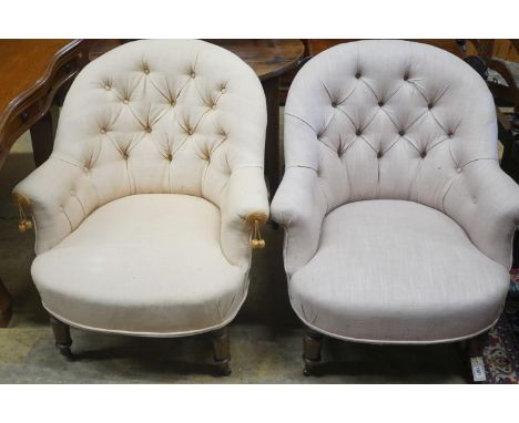 A pair of Victorian upholstered button back tub framed chairs