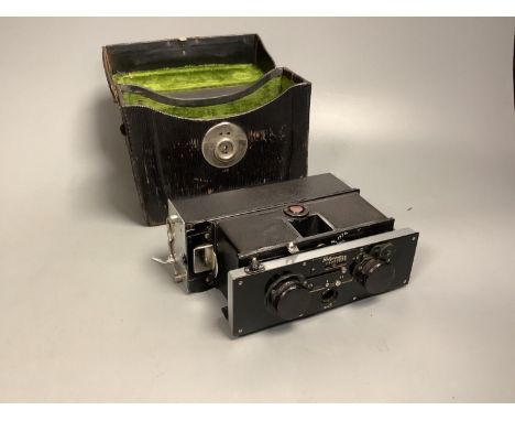 A Polyscop stereo camera together with other 20th century cameras