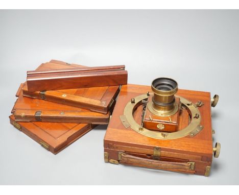 A Thornton Pickard mahogany and brass plate camera, three plates and a stand, 20cm sq.