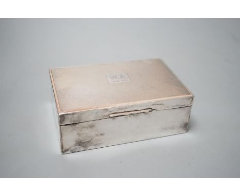 A 1950's part engine turned silver mounted cigarette box, 14.3cm, gross 14.5oz