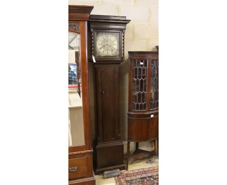 An 18th century oak 8 day longcase clock, marked Wm. Tipling at Leeds, later cased, height 208cm