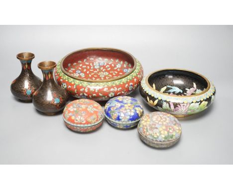 A group of Chinese cloisonné enamel dishes, boxes and a pair of vases, early 20th century and later, largest diameter 17cm