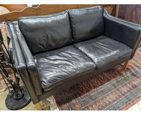 A Danish black leather two seater sofa in style of Borge mogensen, length 142cm, depth 83cm, height 80cm