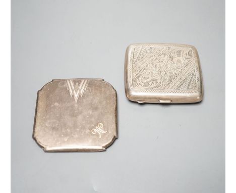 An engine turned silver compact, 83mm and a silver cigarette case.