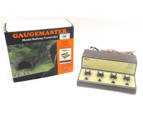 A boxed Gaugemaster Model Q Four track model railway controller Condition Report:Available upon request