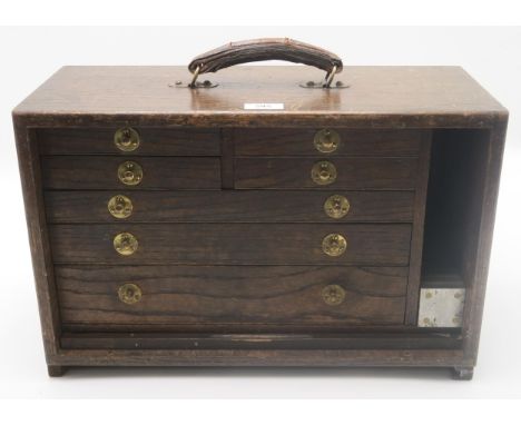 A well-made oak tool chest, containing a large selection of precision engineer's tools, including various levels, calipers, g