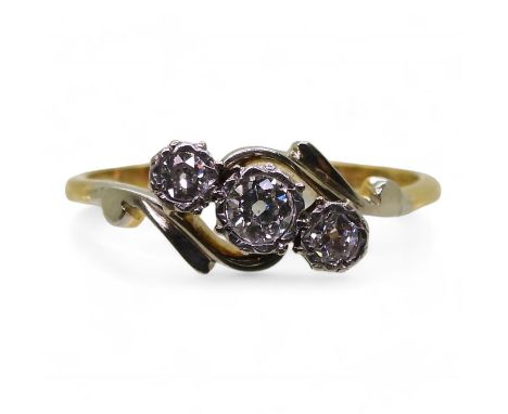 An 18ct gold three stone diamond ring set with estimated approx 0.25cts of old cut diamonds, finger size T1/2, weight 2.9gms 