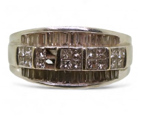 An 18ct white gold diamond cluster ring set with estimated approx 0.90ct of diamonds, (two 0.05ct princess cuts are missing) 