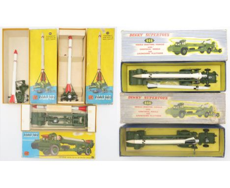 Two boxed Dinky Supertoys 666 Missile Erector Vehicles&nbsp; with Corporal Missile and Launching Platform; a boxed Corgi Majo