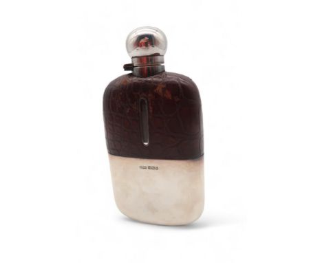 An Edwardian silver and leather cased hip flask, by James Deakin &amp; Sons, Sheffield 1902, 15.5cm x 9.5cm Condition Report: