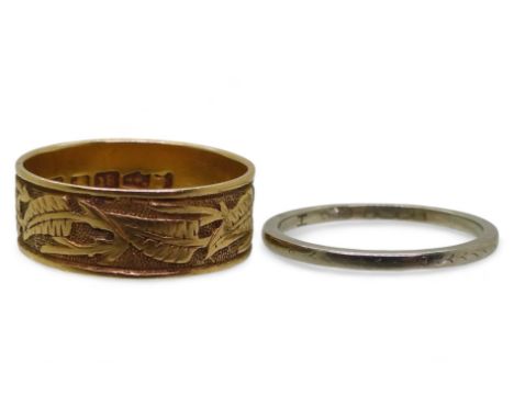 An 18ct gold wide band ring engraved with fern leaves, hallmarked Coley Brothers Chester 1885, N1/2, together with an 18ct wh
