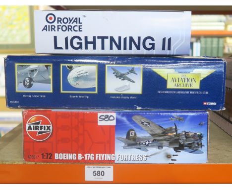 An Airfix 1:72-scale Boeing B-17G Flying Fortress model kit, a Corgi Aviation Archive 1:144-scale AA31803 Boeing B-29 Super F