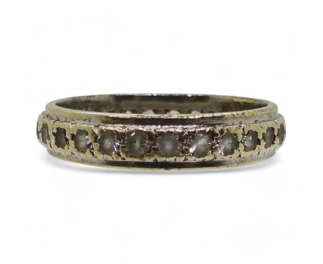 A 9ct clear gem set eternity ring, clear gems (af) size T, weight 3.7gms Condition Report:Available upon request