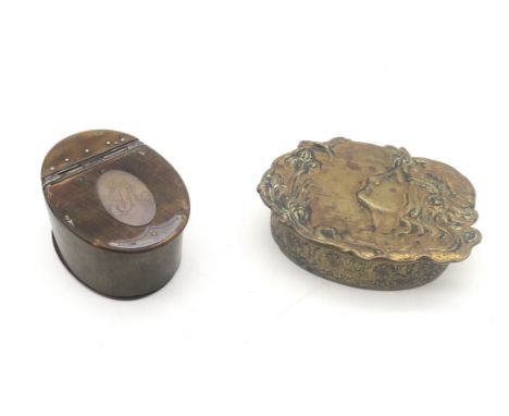 A horn snuffbox, with white metal plaque inset to lid monogrammed R; together with a brass Art Nouveau example (2) Condition 