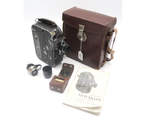 A Zeiss Ikon Movikon 16mm cine camera, housed in a leather case, with additional Carl Zeiss Sonnar 1:4 f=7.5cm lens and instr